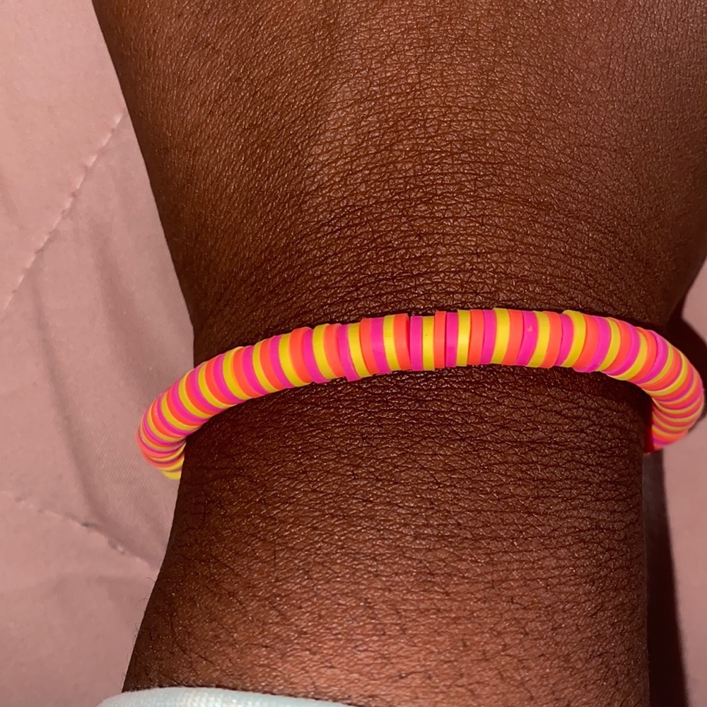 pink yellow and orange bracelet
